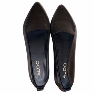 Black leather pointed toe flats